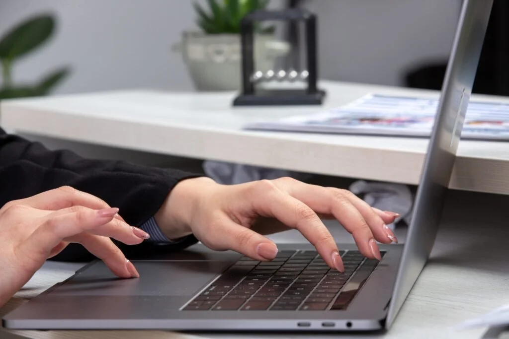 front view girl using laptop front table with schedules graphics using laptop job business activity scaled 1